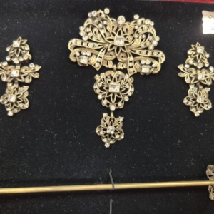 Aderezo latón viejo adulta